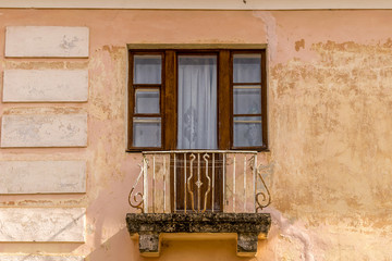 old style windows with a wooden frame and balcony