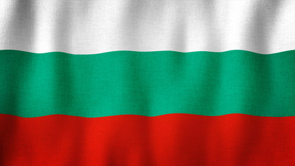 Fototapeta premium Bulgaria flag waving in the wind. Closeup of realistic Bulgarian flag with highly detailed fabric texture