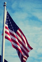 An American Flag on a Flag pole 