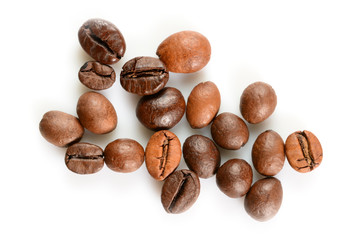 Coffee beans. Some different roasted coffee beans, close up macro, isolated on white background.