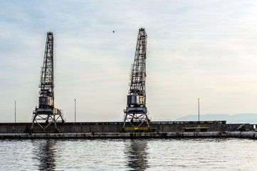 Obraz premium Old cargo cranes in port of Rijeka, Croatia,