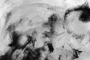 Abstract ink background. Marble style. Black paint stroke texture on white paper. Wallpaper for web and game design. Grunge mud art. Macro image of pen juice. Dark Smear.