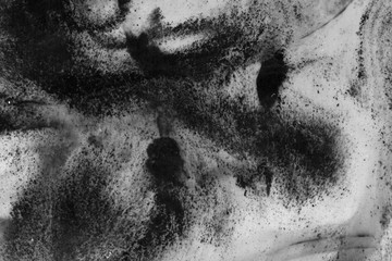 Abstract ink background. Marble style. Black paint stroke texture on white paper. Wallpaper for web and game design. Grunge mud art. Macro image of pen juice. Dark Smear.