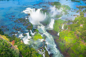 Beautiful aerial view of Iguazu Falls from the helicopter ride, one of the Seven Natural Wonders of...