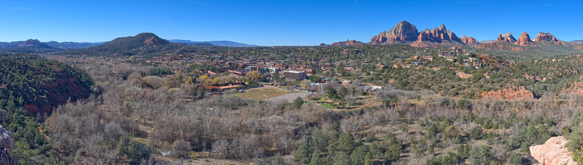 Fototapeta na wymiar Uptown Sedona Arizona viewed from the Huckaby Trail on the far western edge of Mitten Ridge. Composed of 6 photos stitched together.