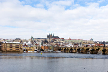 Snowy Prague Lesser Town with Prague Castle and Charles Bridge, Czech republic