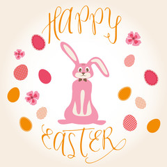 Pink Easter bunny in a wreath with colorful eggs, flowers and orange signature Happy Easter