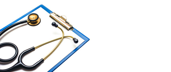 Stethoscope on clipboard horizontal empty copy space.