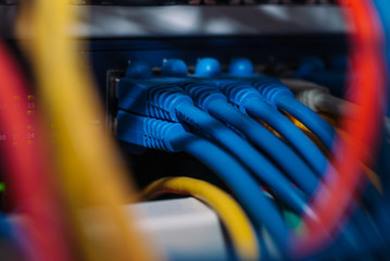 Close up of ethernet network cable with switch