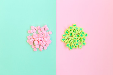 Fashion food set of  heart and clover shaped marshmallows on top , minimalistic design. Contrast ying yang style.