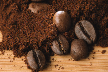 Macro photo of Coffee beans and ground coffee powder