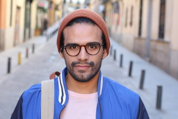 Mixed race person with blank expression outdoors