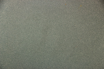 Grey metal and plastic texture background macro