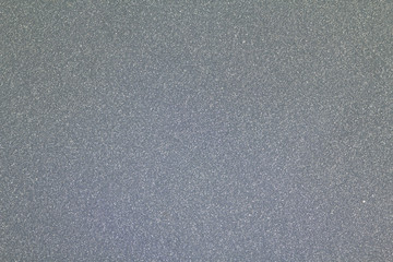 Grey metal and plastic texture background macro