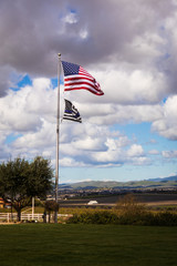 US and Blue Line Flag over Livermore Vineyards