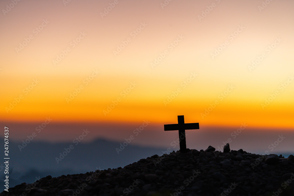 Wall mural symbol of god love to people the mountain at sunset