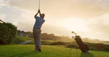 Golfing into the sunset - Powered by Adobe