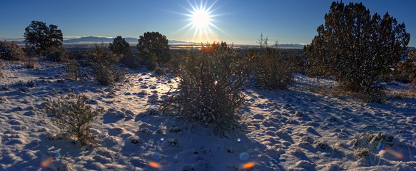 A winter morning panorama from a hill overlooking Chino Valley AZ showing fresh snowfall from a storm the night before.