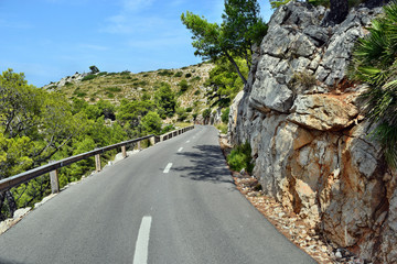 Open coastal road winding through to lighthouse Cap Formentor