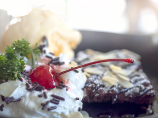  Close up of cherry on Chocolate Brownie Almond Vanilla Ice Cream
