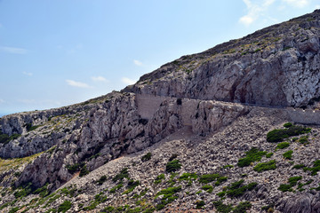 Open coastal road winding through to lighthouse Cap Formentor