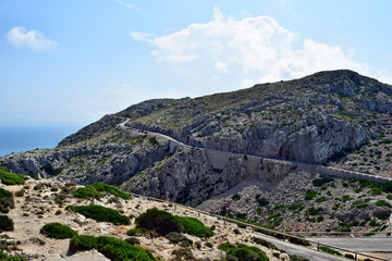 Amazing landscape when driving on an open coastal road winding through to lighthouse Cap Formentor