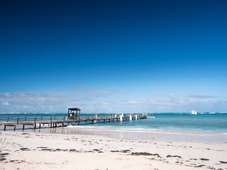 Caribbean destination with wooden jetty in the sea