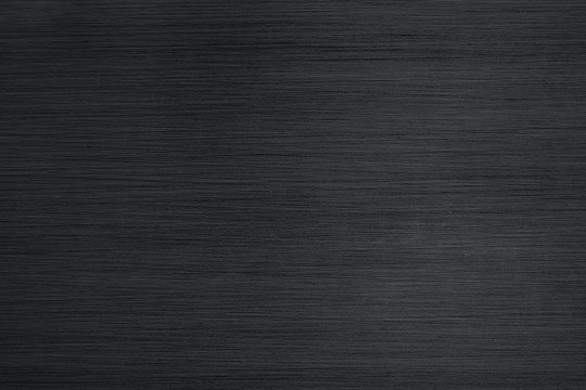 Brushed metal texture background. Stainless black steel