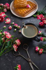 Puff pastries and coffee, Sweets and flowers, Dark background, Top view, March 8, Women's Day