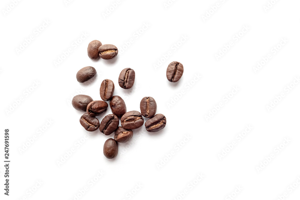 Wall mural coffee beans isolated on white background. close-up.