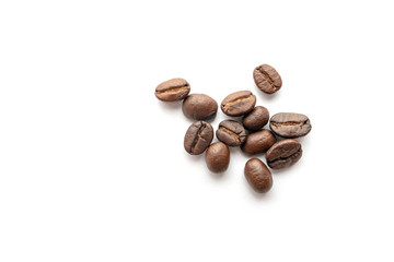 Coffee beans isolated on white background. Close-up.