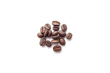 Roasted coffee beans isolated on white background. Close-up.