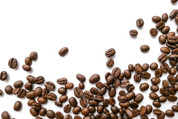 Roasted coffee beans isolated on white background. Close-up.