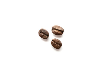 Coffee beans isolated on white background. Close-up.