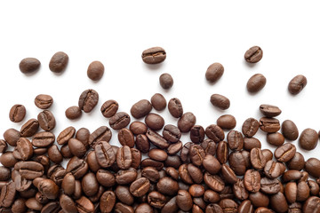 Roasted coffee beans on white background. Close-up.
