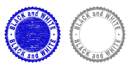 Grunge BLACK AND WHITE stamp seals isolated on a white background. Rosette seals with grunge texture in blue and gray colors. Vector rubber overlay of BLACK AND WHITE tag inside round rosette.