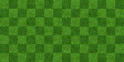 Green grass field background for soccer and football sports. Green lawn pattern and texture background. Close-up.