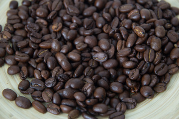 Whole grains of coffee close-up