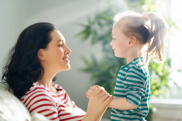 mother and daughter playing