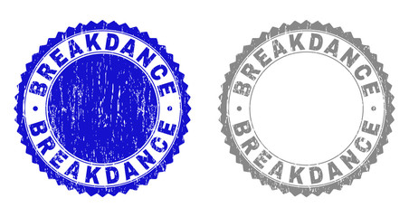 Grunge BREAKDANCE stamp seals isolated on a white background. Rosette seals with grunge texture in blue and grey colors. Vector rubber watermark of BREAKDANCE text inside round rosette.