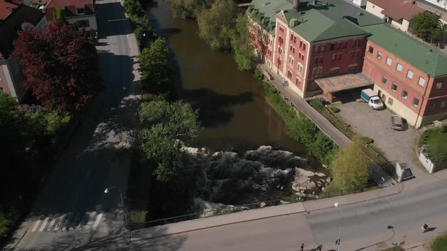Flight over a bridge close to the old castle (Nykopingshus) in Nykoping, Sweden. Aerial in slowmotion