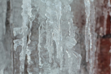 Very large and dangerous icicles close up
