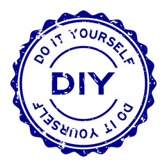 Grunge blue DIY word (Abbreviation of Do it yourself) word round rubber seal stamp on white background