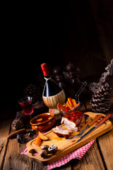 spicy roasted meat with mushroom sauce in the oven