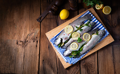 fresh trout with lemon and different herbs