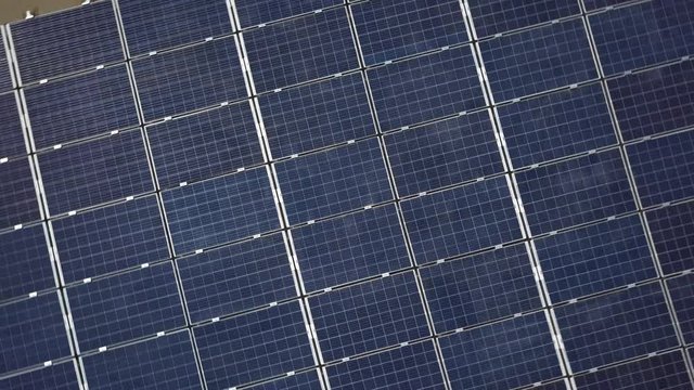 A fly over a solar panel park