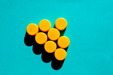 Yellow plastic bottle caps