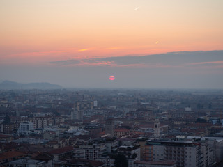 Bergamo, Italy. Landscape to the new city (downtown) at the sunrise from the old town located on the top of the hill