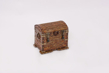 Wooden chest for household items and clothes on white background.
