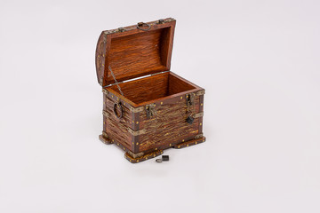 Wooden chest for household items and clothes on white background.